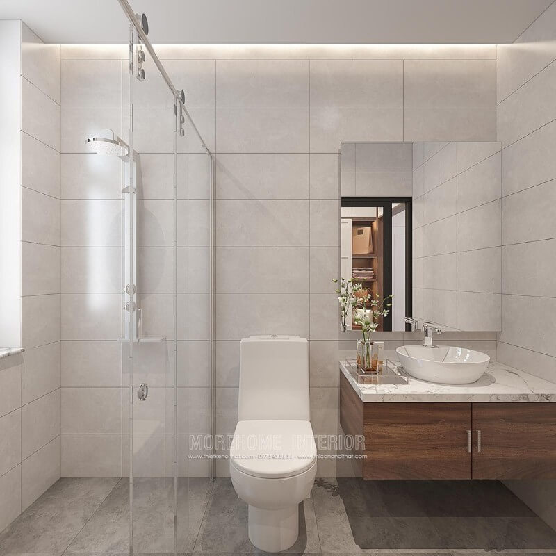 Thiết kế phòng tắm đẹp và hiện đại với ý tưởng sử dụng gam màu đơn sắc màu xám chủ đạo kết hợp chất liệu gỗ óc chó. Mẫu thiết kế sẽ là lựa chọn rất phù hợp trong các không gian vừa và nhỏ như chung cư, nhà phố, nhà liền kề,..